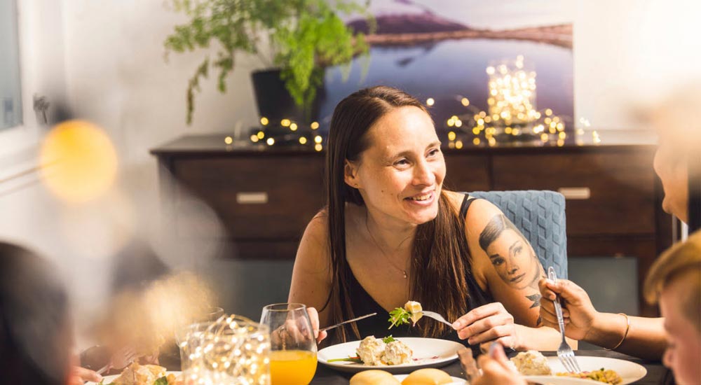 Woman at dinner table
