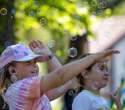 Children playing with bubbles