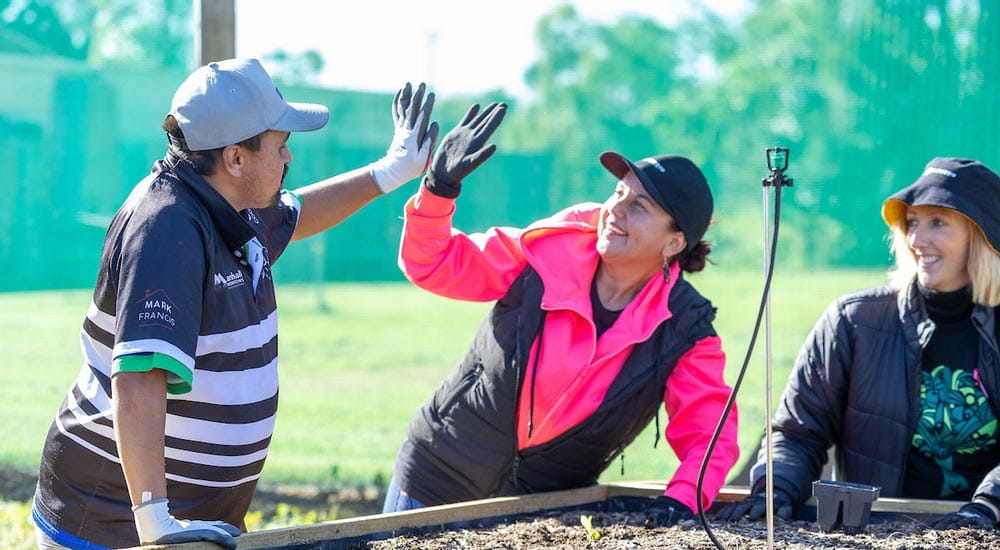 people working in community garden