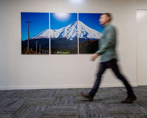 Person walking down office hallway